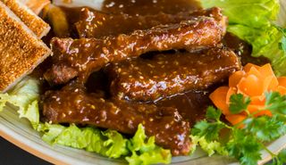 Costillas En Salsa Capital