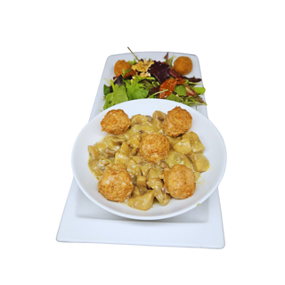 Albóndigas veganas con champis en salsa. 
