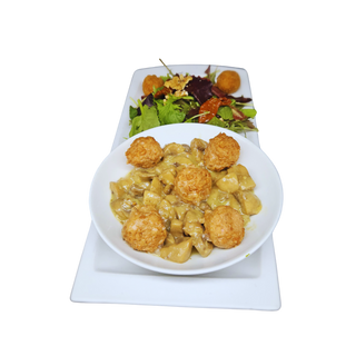 Albóndigas veganas con champis en salsa. 