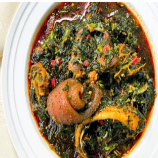 Afang soup with fish+ akpu or semo or garri