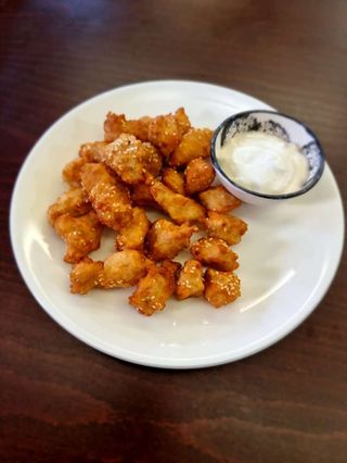 59. Панирани пилешки хапки 200 гр.