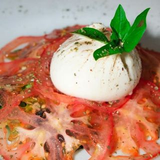 Burrata Con Carpaccio De Tomate