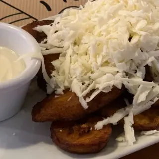 Plátano macho maduro con queso latino 