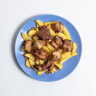 Tapa De Costillas Al Ajillo (1/2 Ración)