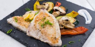 Fileuri de Dorada rumenite la Cuptor