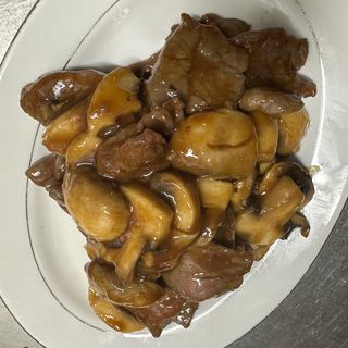 ternera con champiñones