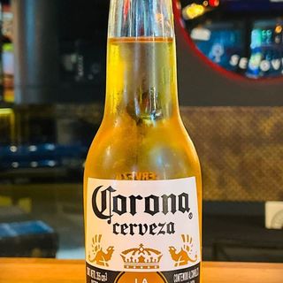 * CERVEZA CORONA TERCIO