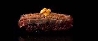 300. Nigiri riso nero flambé maguro