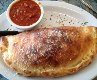 64. Pizza Calzone (30 Cm.)