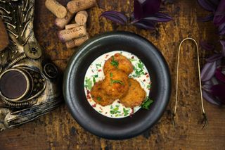 Chicken Balls with shkmeruli Sauce