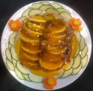 Pato Asado Con Naranja