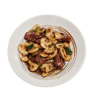 Wok de ternera con champiñones