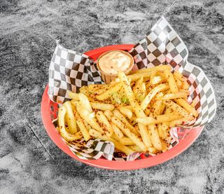 Papas fritas al fuego