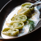 პელმენები ისპანახითა და ყველით იოგურტ-ნივრის სოუსში/Dumplings with spinach and cheese in yogurt-garlic sauce