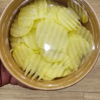 Patate affettate pronte x friggere 