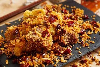 94. Piedini di maiale saltati al cumino piccante