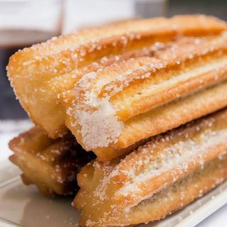 Churros con Chocolate a la Taza, Nutella o Pistacho (4 uds.) 