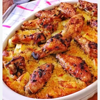 Riso con 4 alette di Pollo + bibite O Aqua 