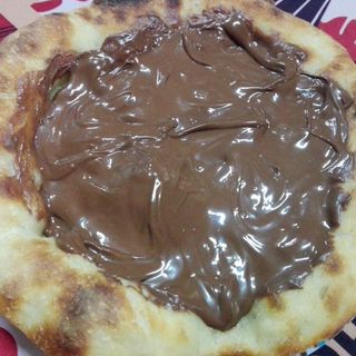 Schiacciata nutellina con zucchero a velo	