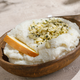 ღომი შებოლილი სულგუნით და ფუჩხოლიათი