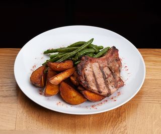 Стейк із свинини на кістці (180/220/40г)