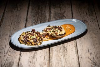 Carxofa a la brasa amb pernil