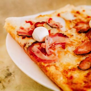 Pancetta e pepe nero in teglia