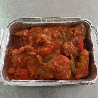 Conejo frito con tomate