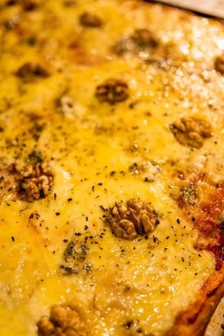 Pizza Melty (4 Personnes) + votre boisson préférée