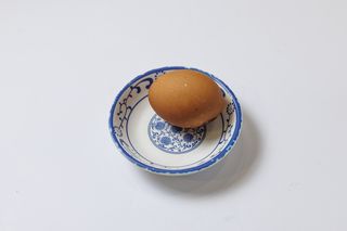 Яйцо вареное черное 