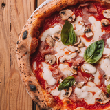 PIZZA PROSCIUTTO E FUNGHI.