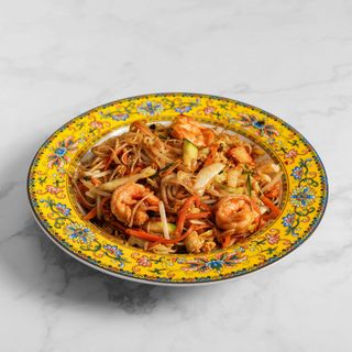 Spaghetti di riso saltati con frutti di mare misti