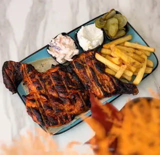 Jumătate de pui la grill