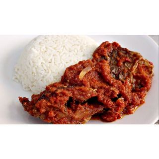 Plained Boiled Rice Served With Fish Stew
