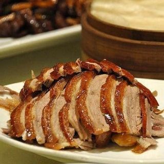 Pato laqueado estilo pekinesa (con tortas)