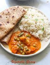 2plates Of Brown Rice, Chapati, Gravy +2 Sodas