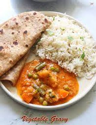 2plates Of Brown Rice, Chapati, Gravy +2 Sodas