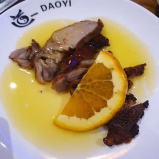 Pato rebosado a la naranja