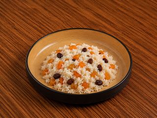 Pilaf with raisins and dried apricots.