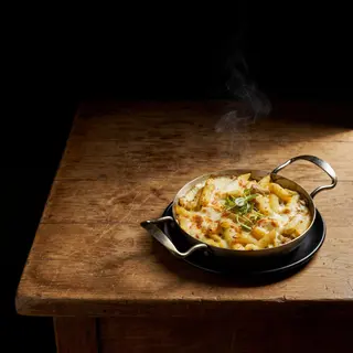 Penne gratinate cu pui si ciuperci