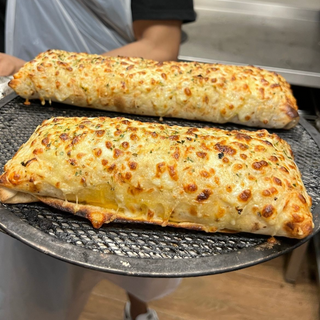 Burrito gratinado pollo y mozarella