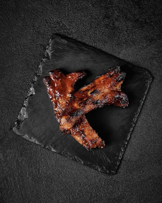 Ребра свинні у фірмовому соусі 250г)