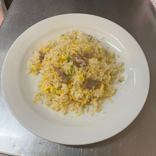 142. Riso saltato con vitello