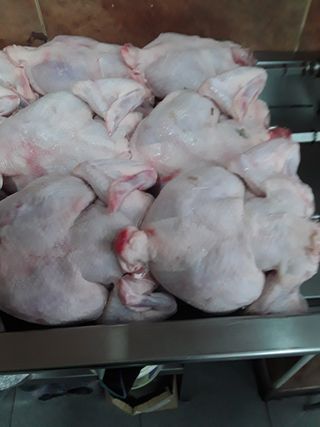 Dos pollos asados con patatas fritas 