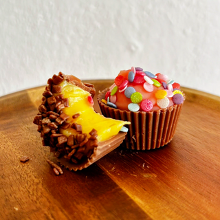 Cápsula de chocolate rellena de brigadiero