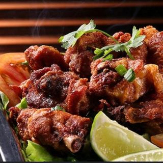 Porção de Frango a Passarinho