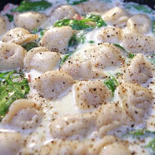 Пельмені у вершковому соусі (250г)