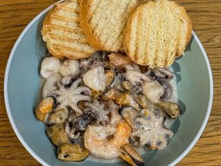 Асорті морепродуктів у вершковому соусі (200g)