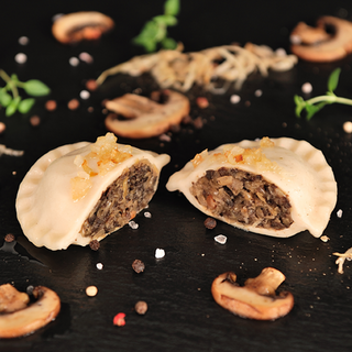Pierogi z kapustą i pieczarkami 8szt.