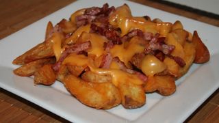PATATA CON CHEDDAR E BACON